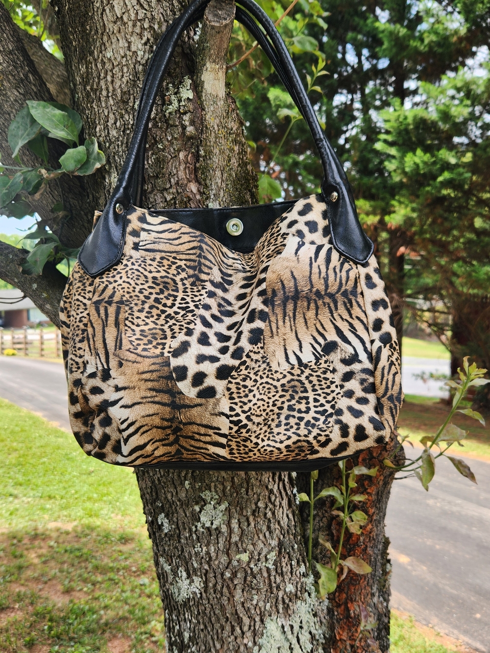 Animal-Print Shoulder Bag in Black and Tan